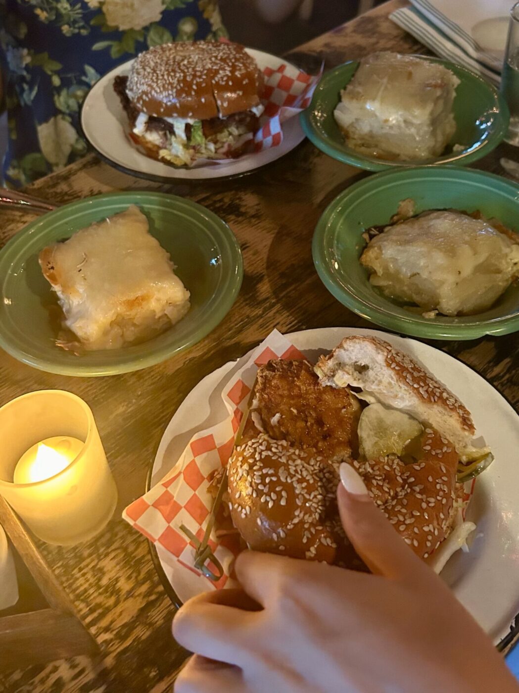 Fried chicken sandwiches and scalloped potatoes at Leon's Oyster Shop in Charleston, South Carolina